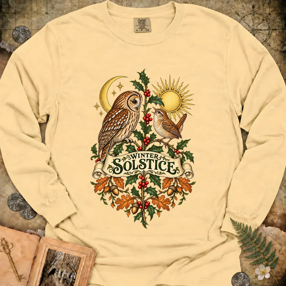 Winter Solstice Botanical Crest Long Sleeve T-Shirt - Butter